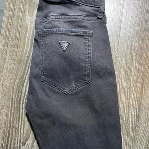 Mid rise, distressed black guess jean